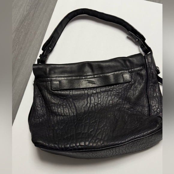 Allsaints Maya Leather foldable Shoulder
Bag in Taupe MSRP: $395 black - Picture 2 of 8